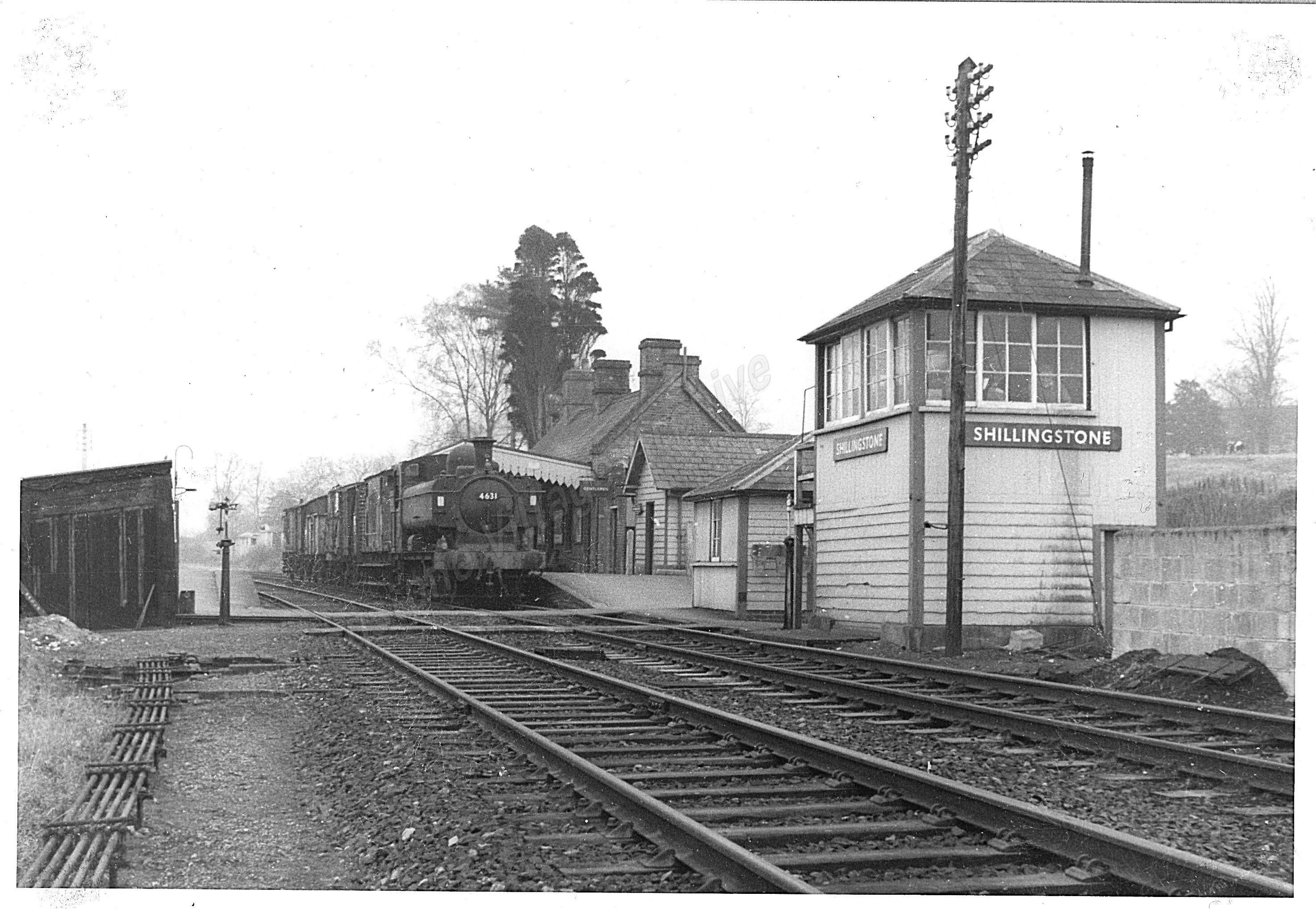 c. 1964: Goods Train pulled by Class 8750 0-6-0 Pannier Tank Locomotive #4631